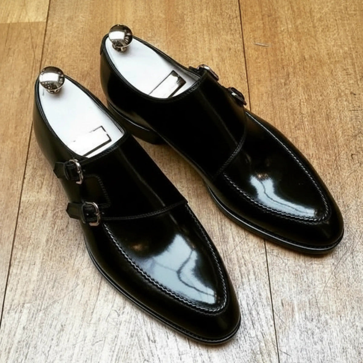 Black leather double monk strap dress shoes for men by Marcello Sarto