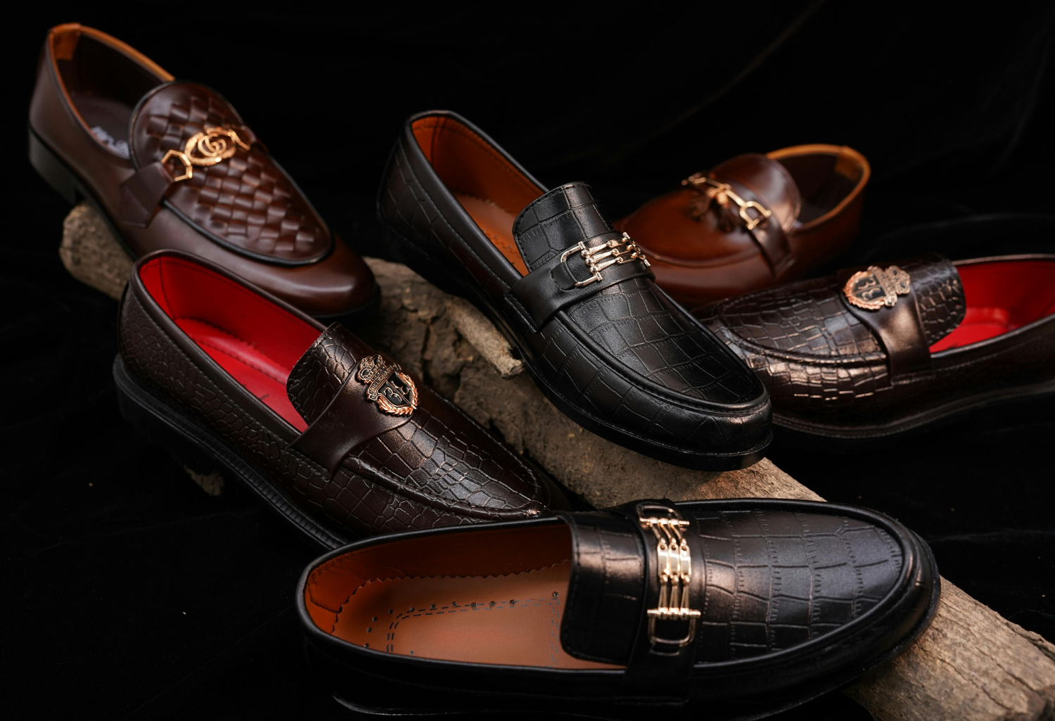 Collection of handmade leather dress shoes and boots in various styles